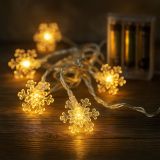 Świąteczny świetlny łańcuch - płatki śniegu, ciepła biel, 20