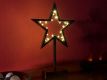 Świąteczna dekoracja - brązowa gwiazda na stojaku